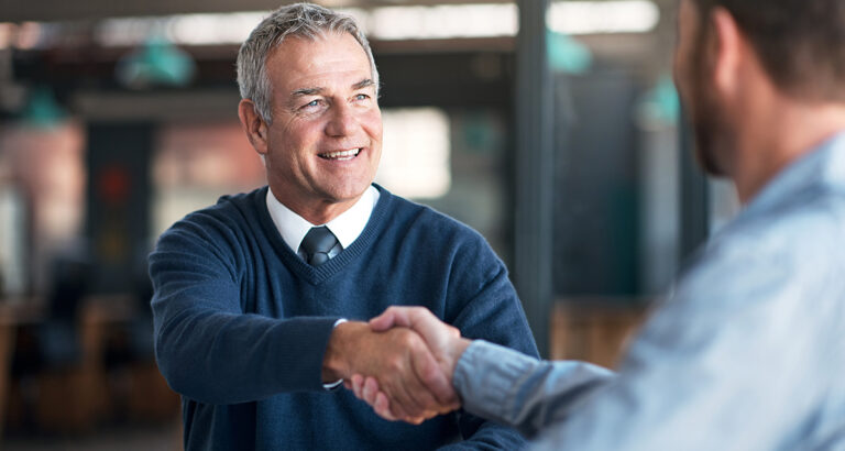 2 men shaking hands